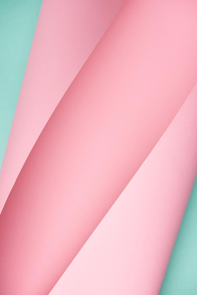 美しい創造的な抽象的なピンクとターコイズ ブルーの用紙の背景 ロイヤリティフリー写真 画像素材