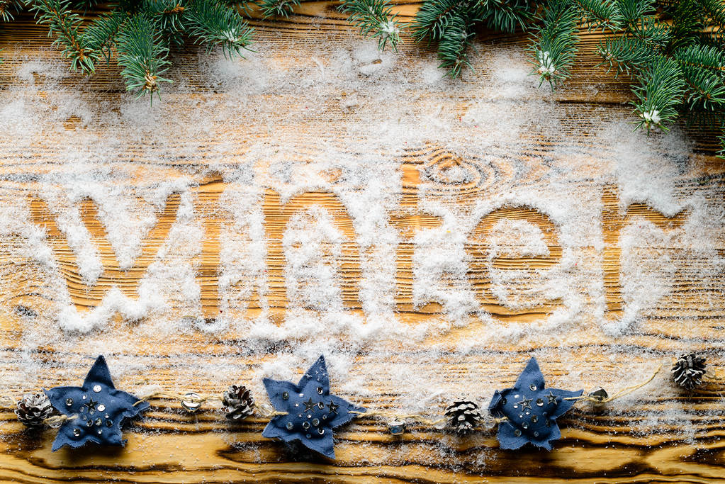 Christmas background. Fir branches on wooden background with wri - Photo, Image