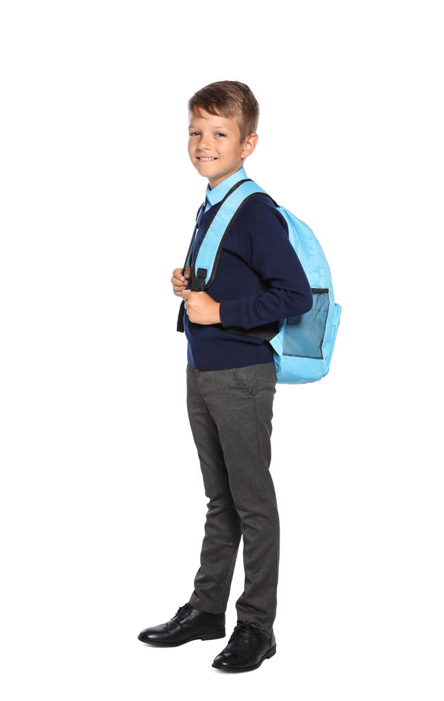 Маленький хлопчик у стильній шкільній формі на білому тлі
 - Фото, зображення