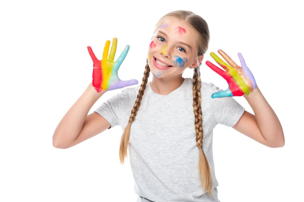 Lächelndes Schulkind mit farbig bemalten Händen auf weißem Hintergrund - Foto, Bild