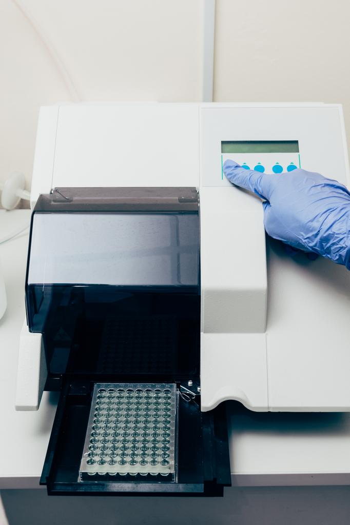 cropped image of scientist using pcr cycler in biotechnology laboratory  - Photo, Image