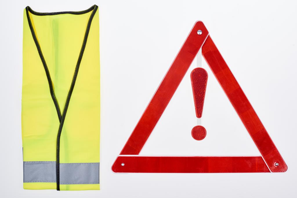top view of warning triangle and reflective vest isolated on white - Photo, Image