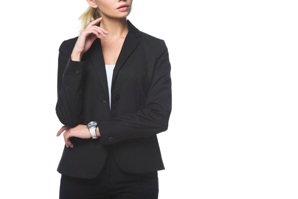 oříznuté záběr mladá podnikatelka v černém obleku izolované na bílém - Fotografie, Obrázek