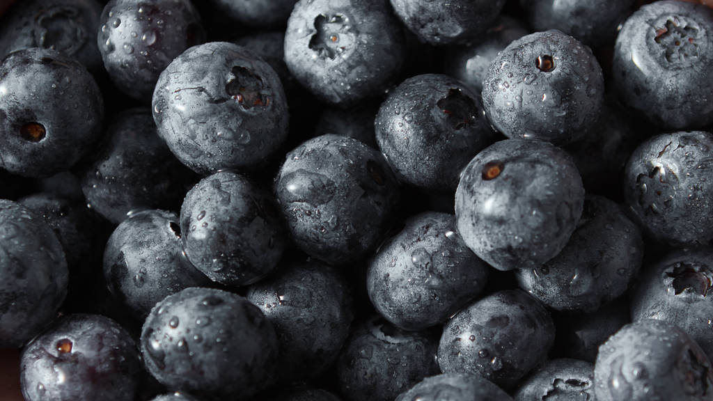 Blueberries fresco fundo de verão. Conceito de alimentação saudável vegetariana orgânica limpa. Vista superior
. - Foto, Imagem