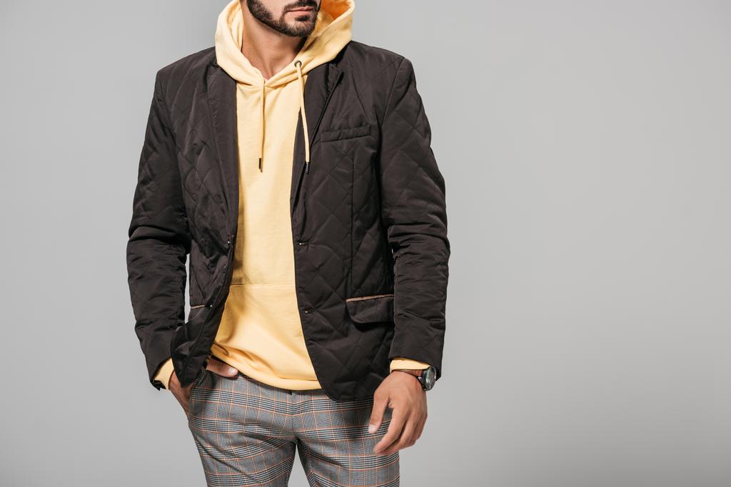 cropped image of male model in stylish autumn outfit isolated on grey background  - Photo, Image