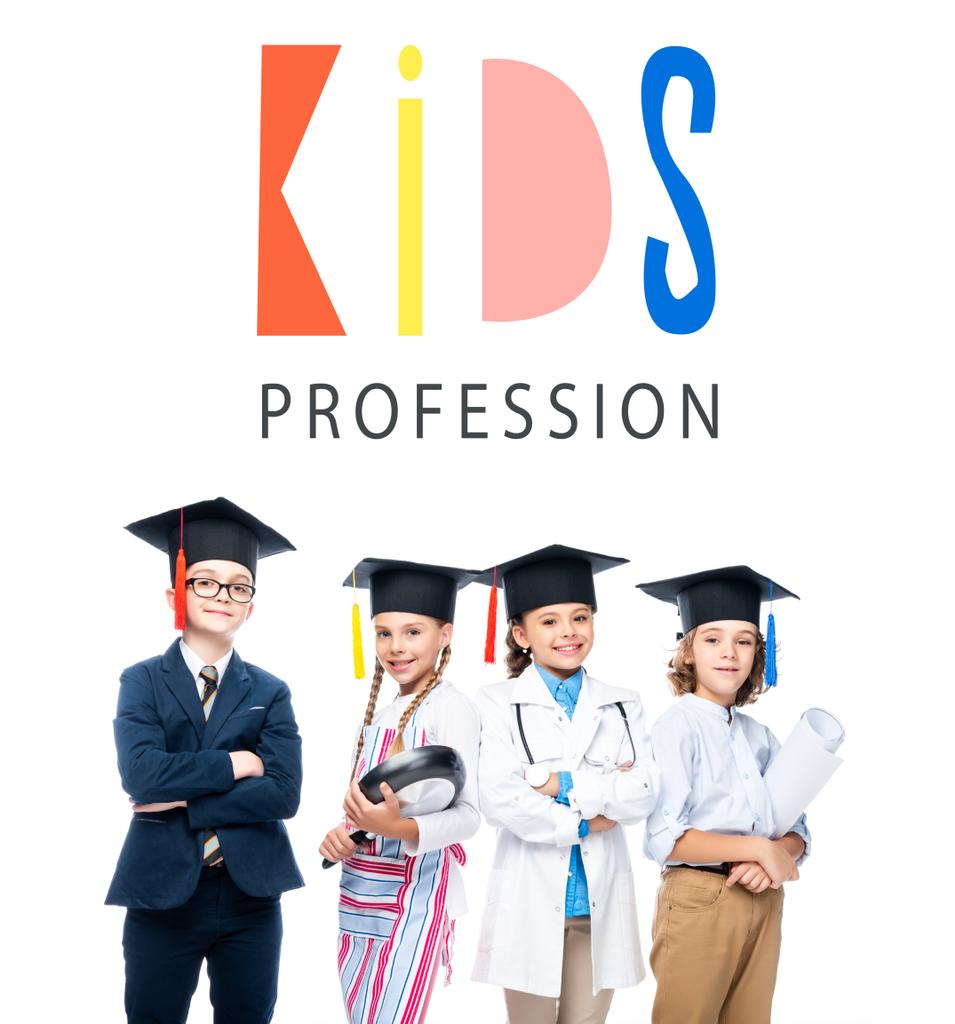 schoolchildren in costumes of different professions and graduation caps isolated on white, with "kids profession" lettering - Photo, Image