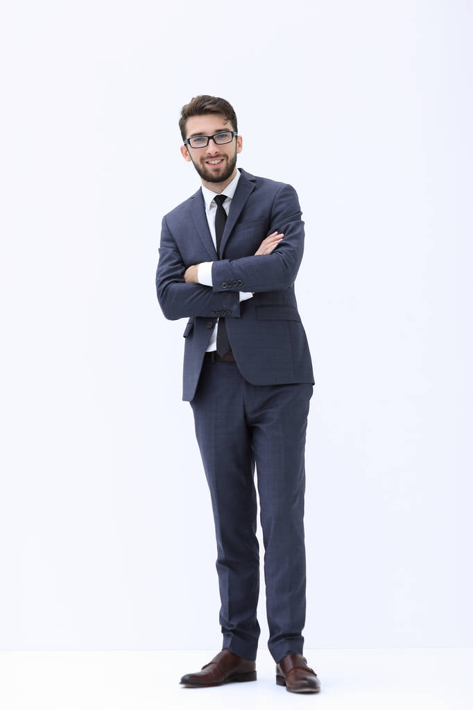 Young businessman standing with hands in pockets. - Photo, Image