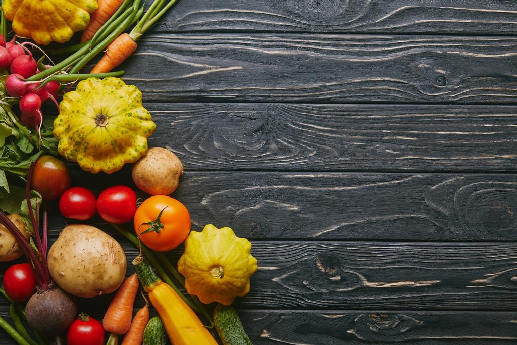Whole fresh vegetables on dark wooden table - Photo, Image