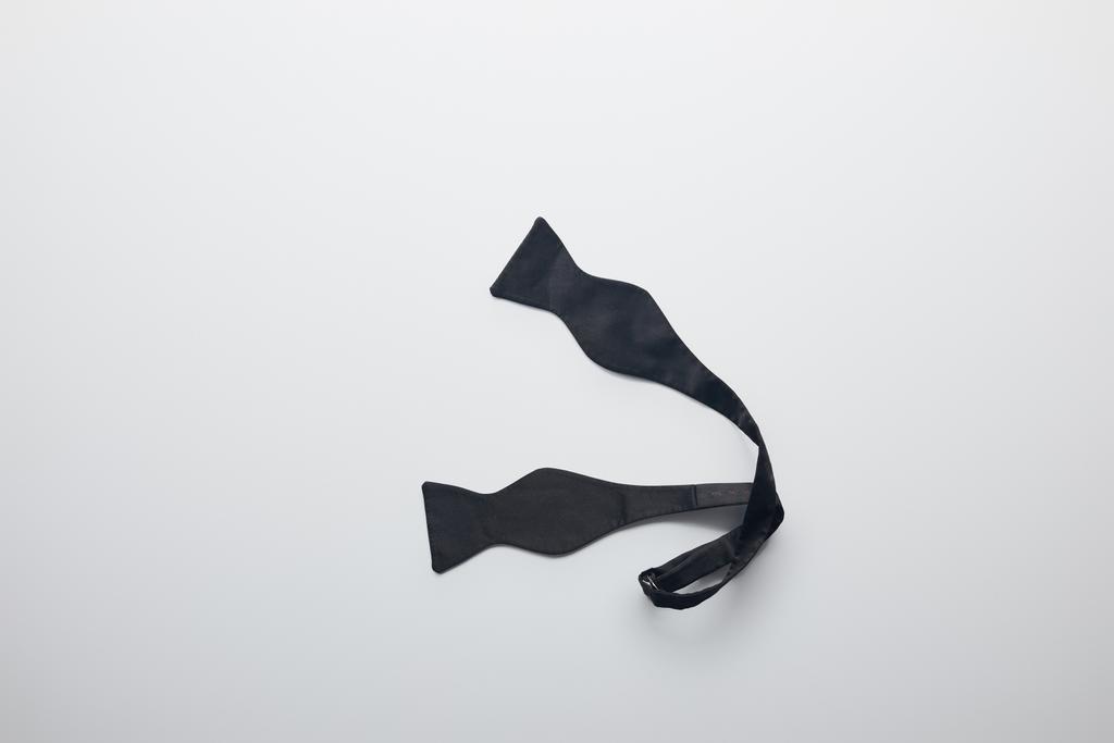 vista superior de laço preto desatado gravata isolada no branco
 - Foto, Imagem