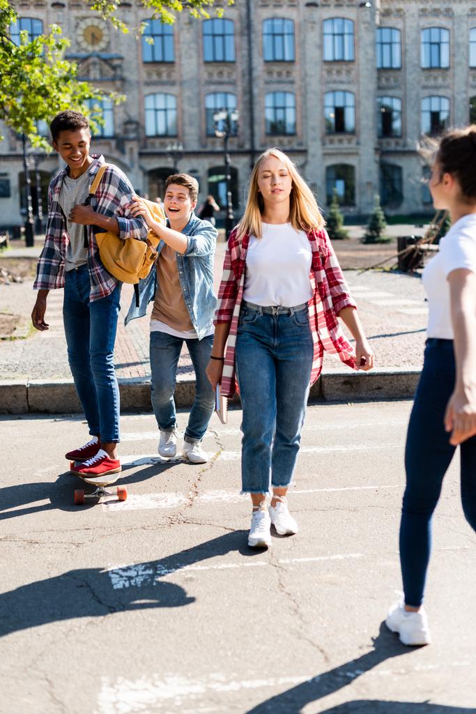 group of teenagers having fun together after school - Photo, Image