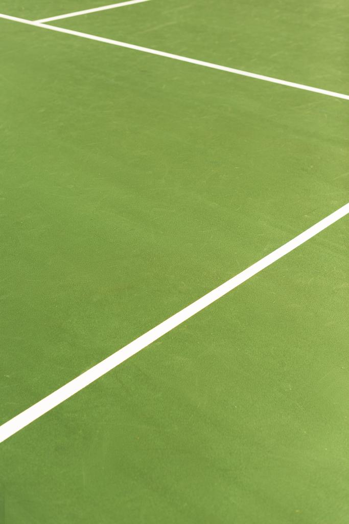 vista de cerca de la pista de tenis verde con fondo de líneas blancas
 - Foto, imagen