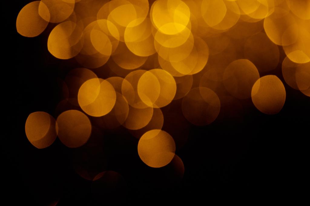 золотой праздничный боке на черном фоне для отдыха
  - Фото, изображение