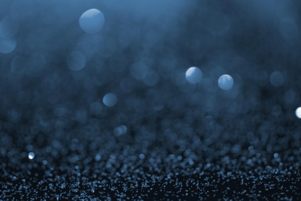 abstract blauw glitter met bokeh op achtergrond - Foto, afbeelding