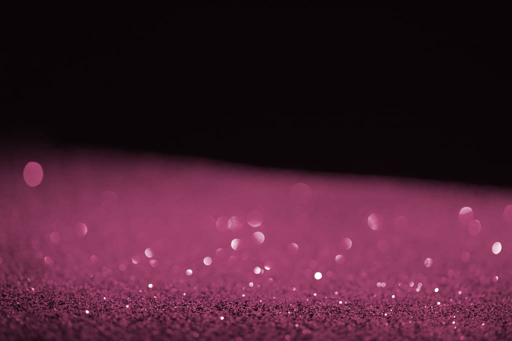 hämärtynyt violetti hehkuva glitter mustalla taustalla
 - Valokuva, kuva