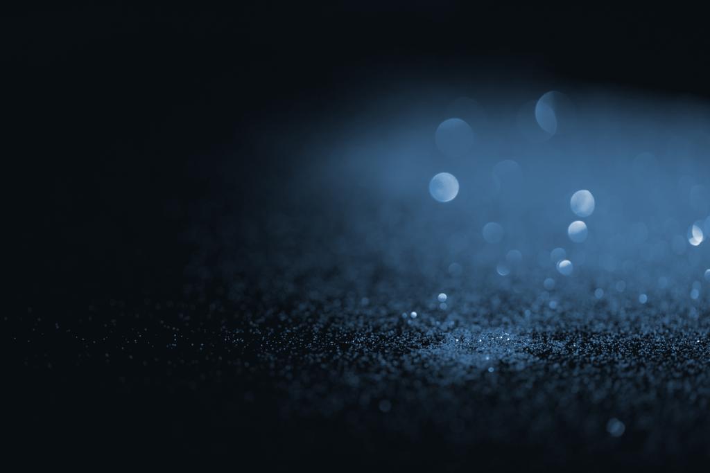 hämärtynyt sininen glitter tummalla pohjalla
 - Valokuva, kuva