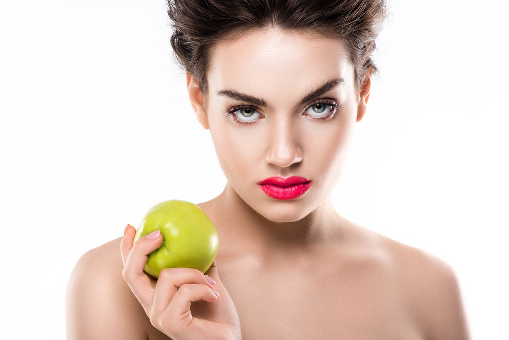 beautiful elegant woman holding green fresh apple, isolated on white - Photo, Image