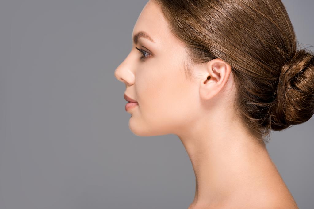 side view of beautiful woman with perfect skin isolated on grey - Photo, Image