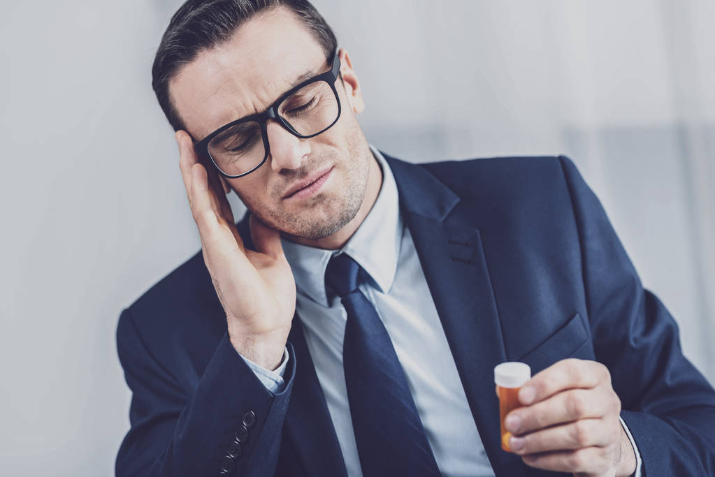 Sick businessman suffering from migraine - Photo, Image