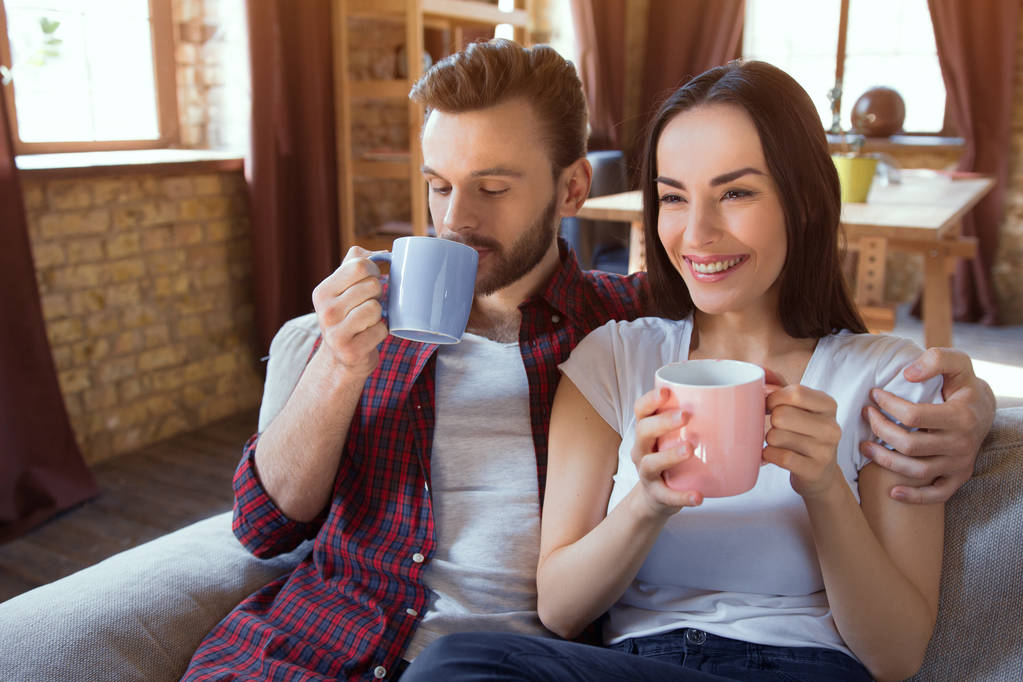 Lovely couple drinking coffee together. - Photo, Image