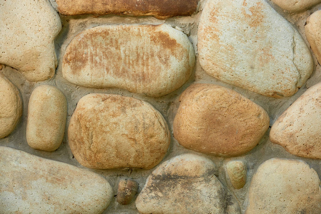 vergrote weergave van verweerde stenen muur textuur, volledige frame achtergrond   - Foto, afbeelding
