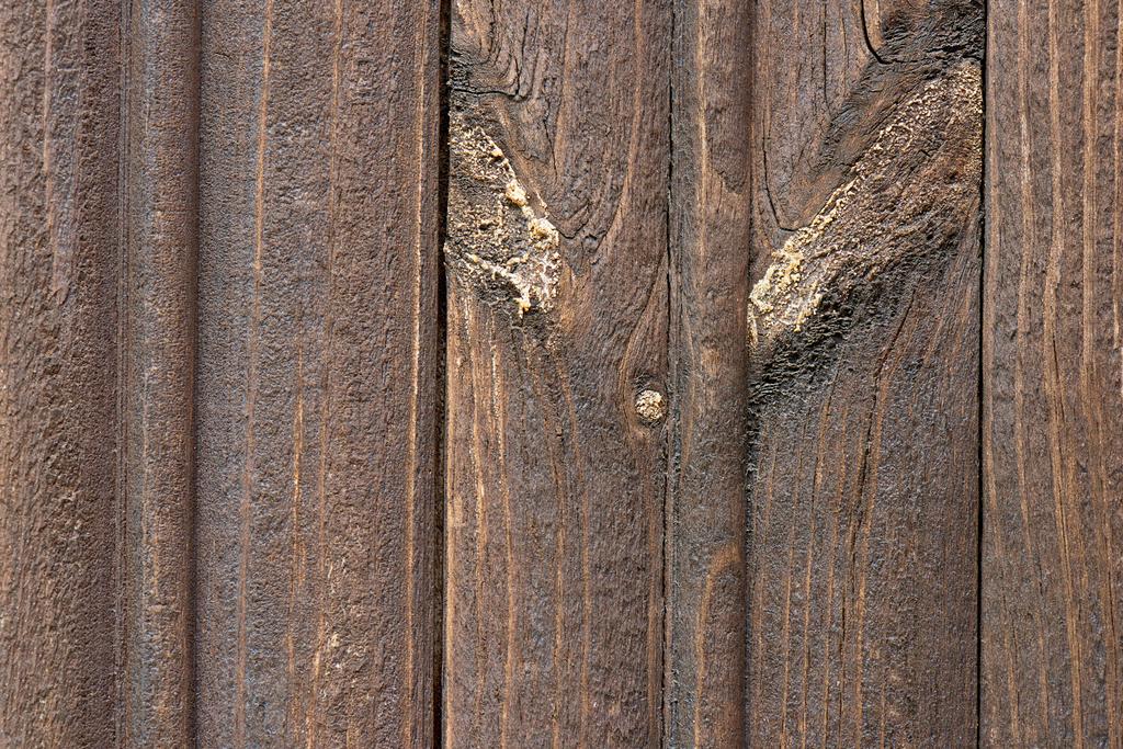 Προβολή με μεγέθυνση από σκούρο καφέ ξύλινες σανίδες, φόντο πλήρους καρέ  - Φωτογραφία, εικόνα