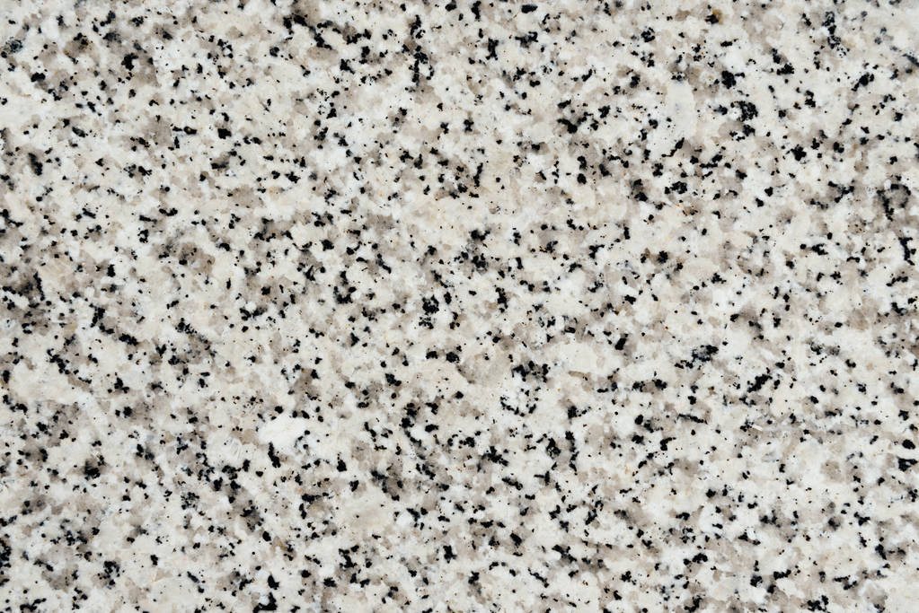 absztrakt textúra könnyű márvány kő, fekete pöttyökkel - Fotó, kép