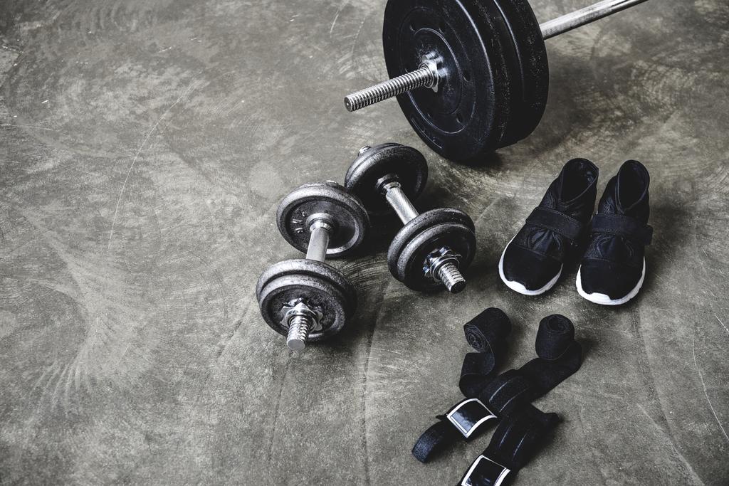 various workout equipment on concrete surface - Photo, Image