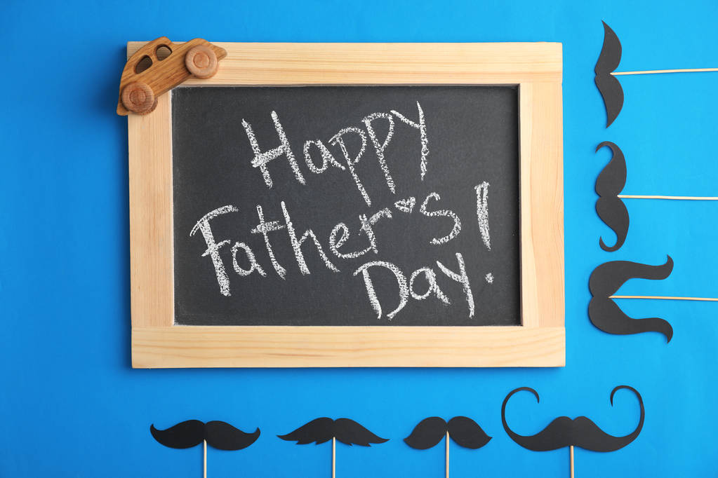 Flat lay composition with blackboard and moustaches on color background. Happy Father's Day - Photo, Image