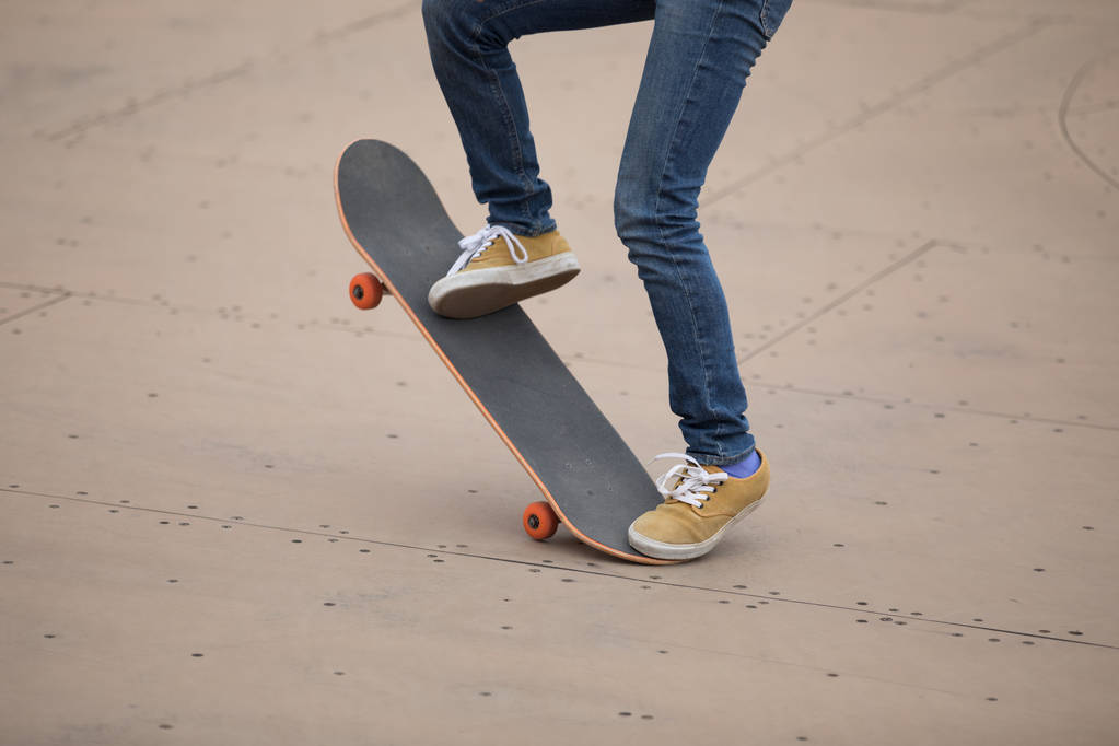 young woman skateboarding on skatepark ramp - Photo, Image