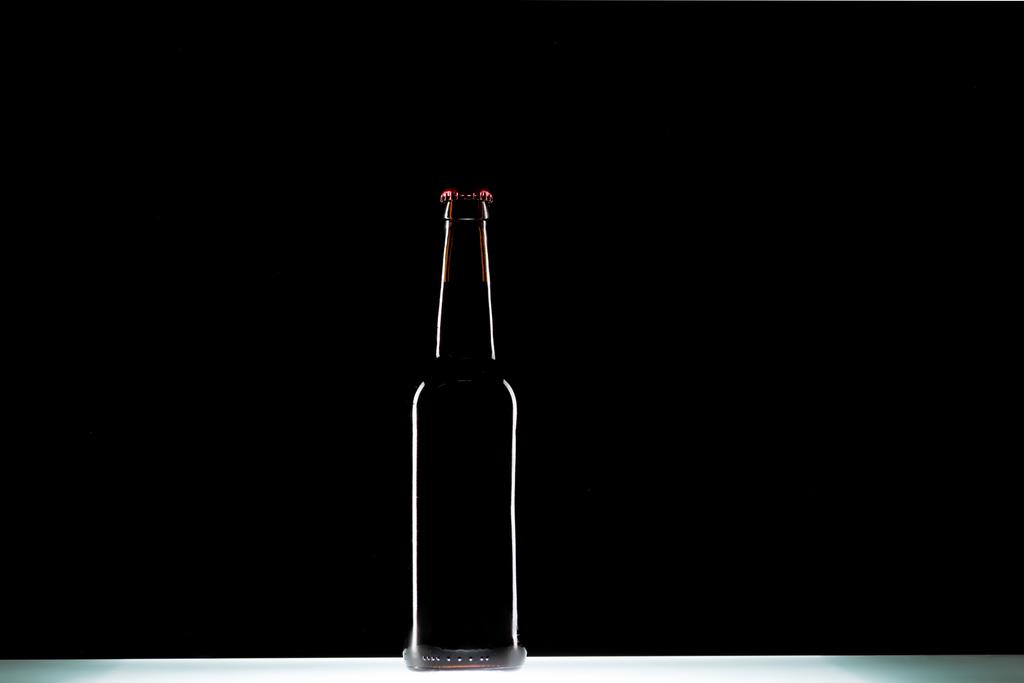 Beer Bottle At Table On Black Background, Free Stock Photo and Image