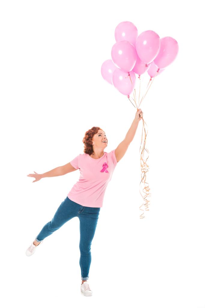 cheerful woman holding bunch of pink balloons isolated on white, breast cancer concept - Photo, Image