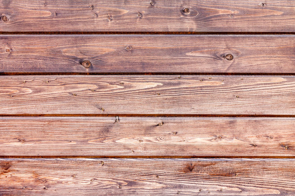 horizontale Holzplatte aus dunklem Holz für den Hintergrund. - Foto, Bild