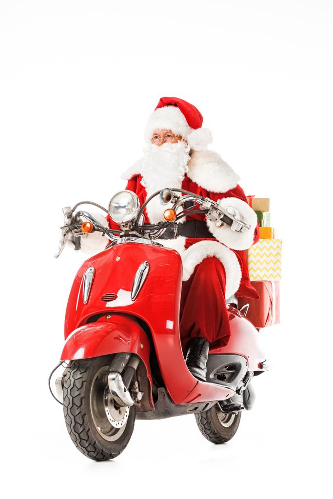 Санта-Клаус на винтажном красном скутере с подарочными коробками, изолированными на белом
 - Фото, изображение