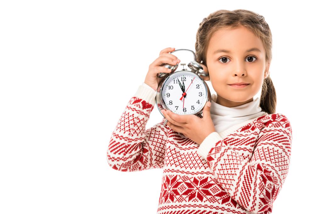 adorable little child holding alarm clock and looking at camera isolated on white - Photo, Image