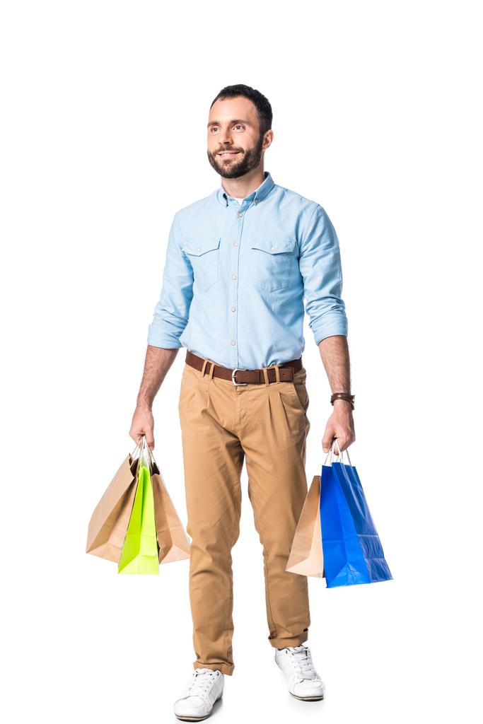 bebaarde man met boodschappentassen geïsoleerd op wit - Foto, afbeelding