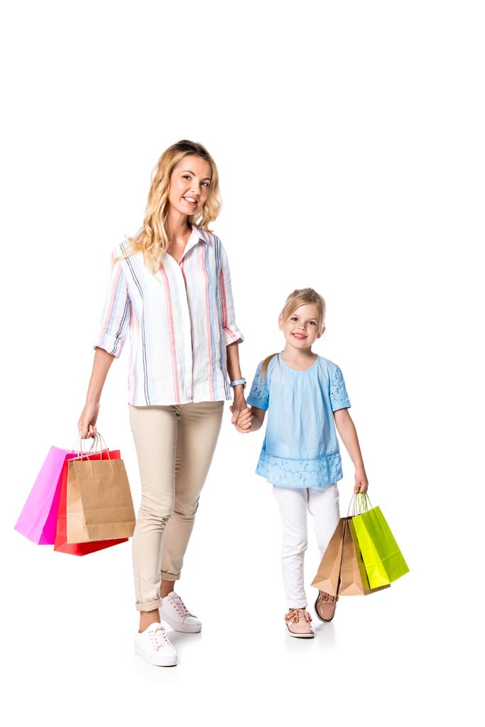 matka i córka z torby na zakupy na białym tle - Zdjęcie, obraz