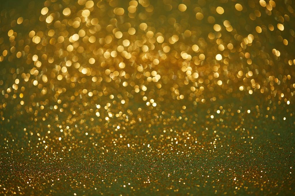 golden and green bokeh christmas background with shiny glitter - Photo, Image