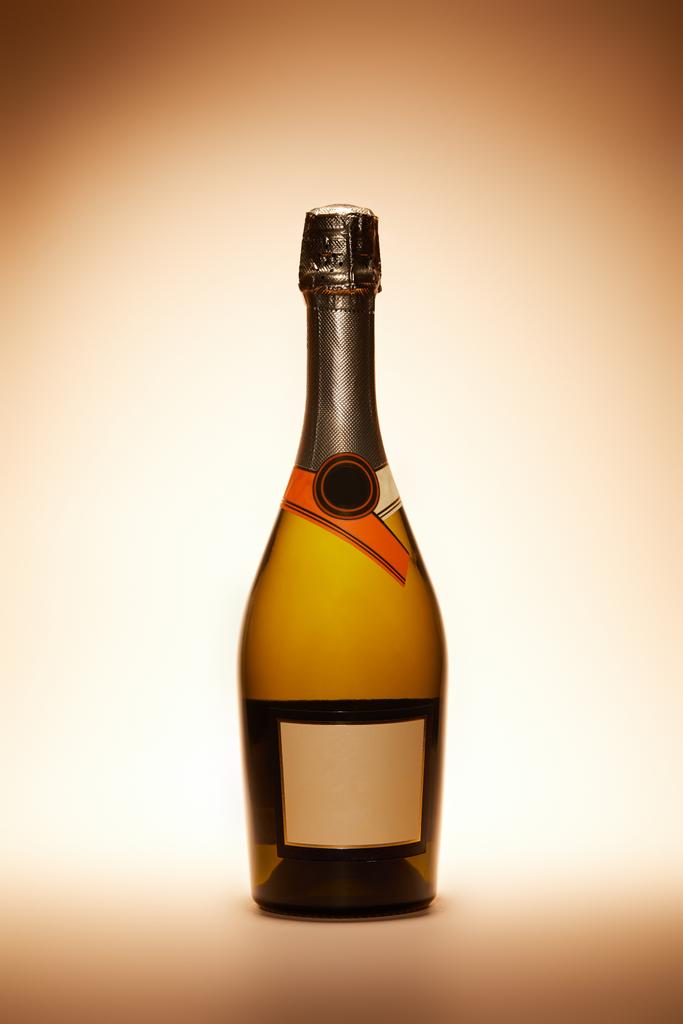 champagne bottle isolated on beige, christmas concept - Photo, Image