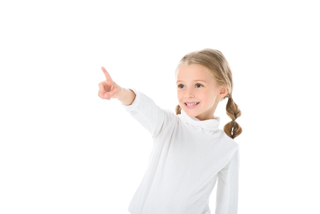 adorable enfant souriant avec des tresses montrant quelque chose, isolé sur blanc
 - Photo, image