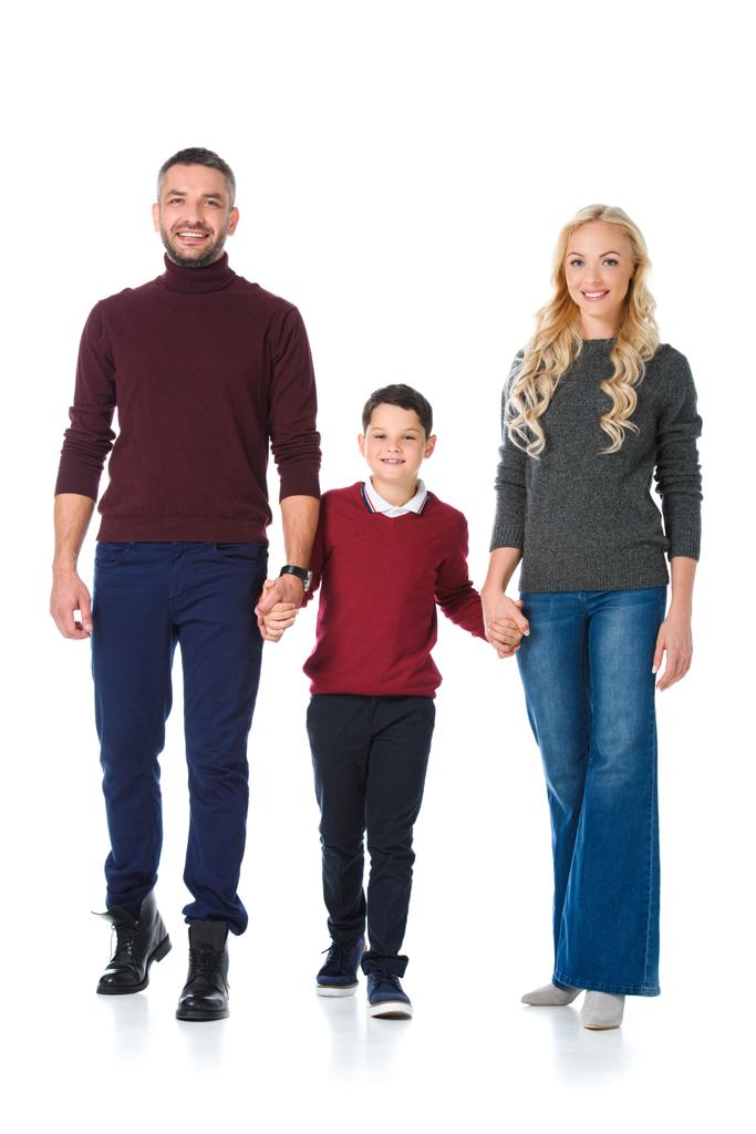 mostrando os pais de mãos dadas com o filho na roupa de outono, isolado em branco
 - Foto, Imagem