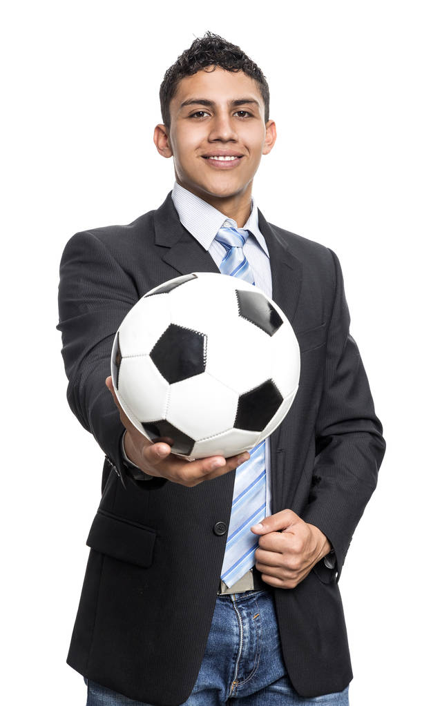 Executive fiatalember, mosolygós, futball-labda a kezében - Fotó, kép