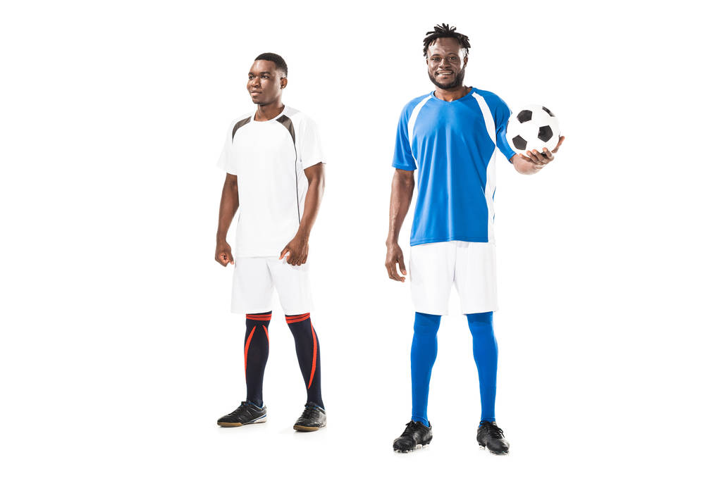 full length view of athletic young african american sportsmen standing with soccer ball isolated on white  - Photo, Image