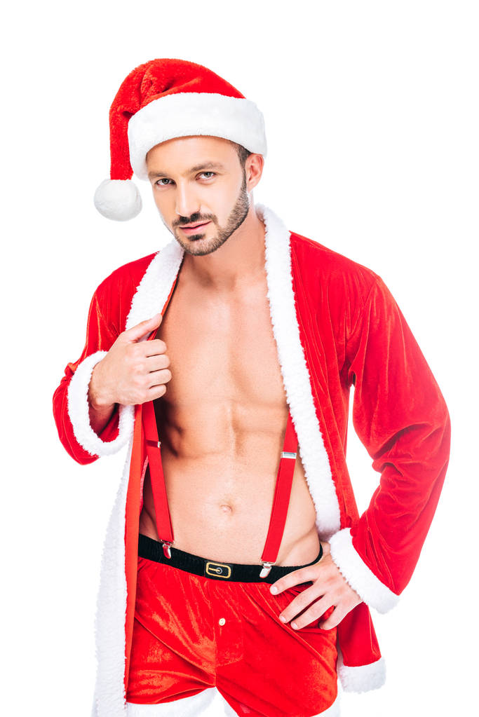 handsome muscular man in santa claus costume showing torso isolated on white background - Photo, Image