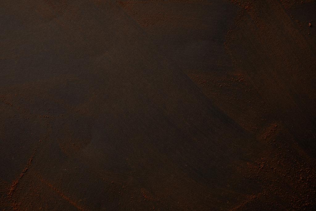 вид сверху на изысканный какао порошок на черном фоне
 - Фото, изображение