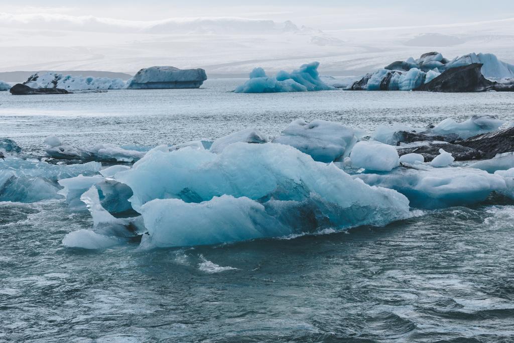 glacier ice pieces floating in lake in Jokulsarlon, Iceland - Photo, Image