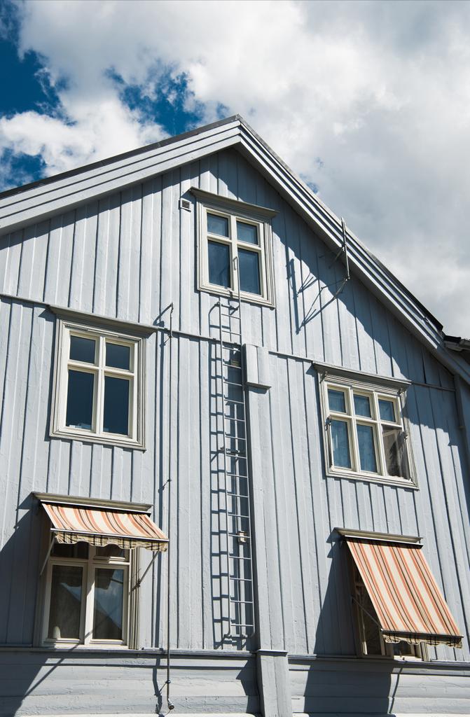 low angle view of beautiful building under cloudy blue sky Lillehammer, Oppland, Norway - Photo, Image