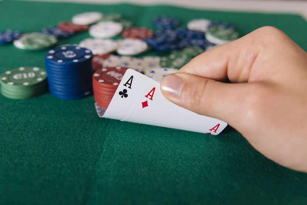 partial view of hand holding cards, Playing cards on a green table casino - Photo, Image