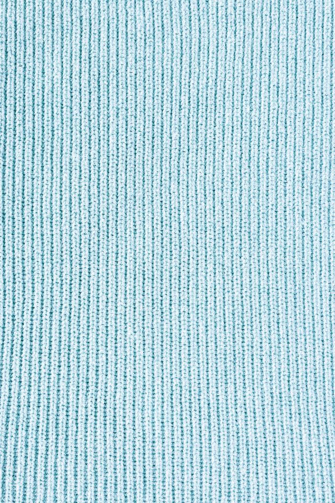 κλείνω πάνω θέα του μπλε μάλλινο ύφασμα ως φόντο - Φωτογραφία, εικόνα