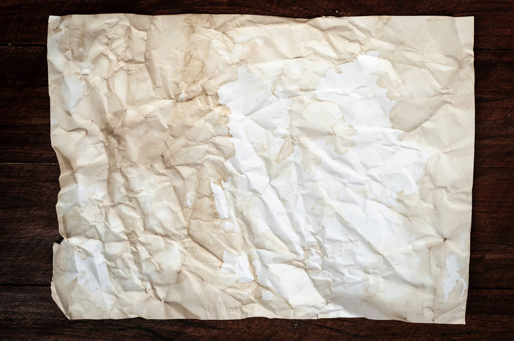 Фон текстуры смятой старой бумаги с пятном и пятном
 - Фото, изображение