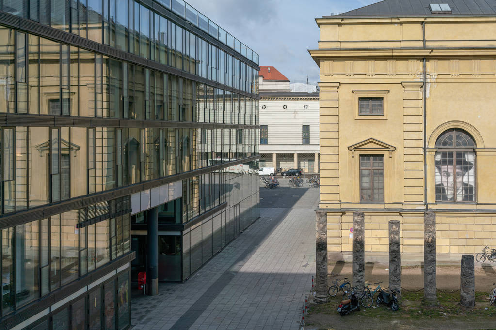Munich, experimental theater Marstall, reflection in the windows of the business center, March 2018 - Photo, Image